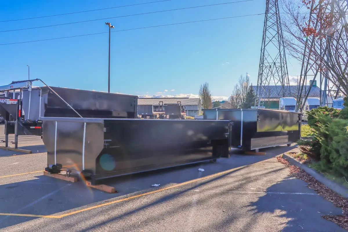 Roll-off dumpster ready for waste disposal at job site for Concrete Dumpster Rental in Bellevue